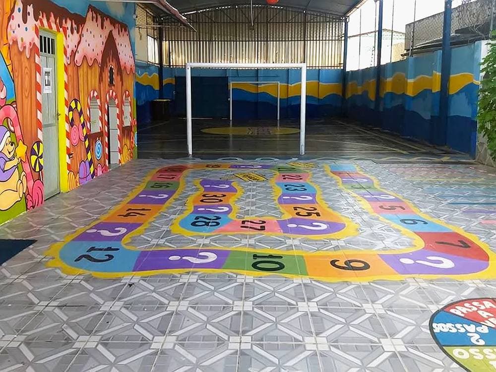 Pátio coberto e área de recreação